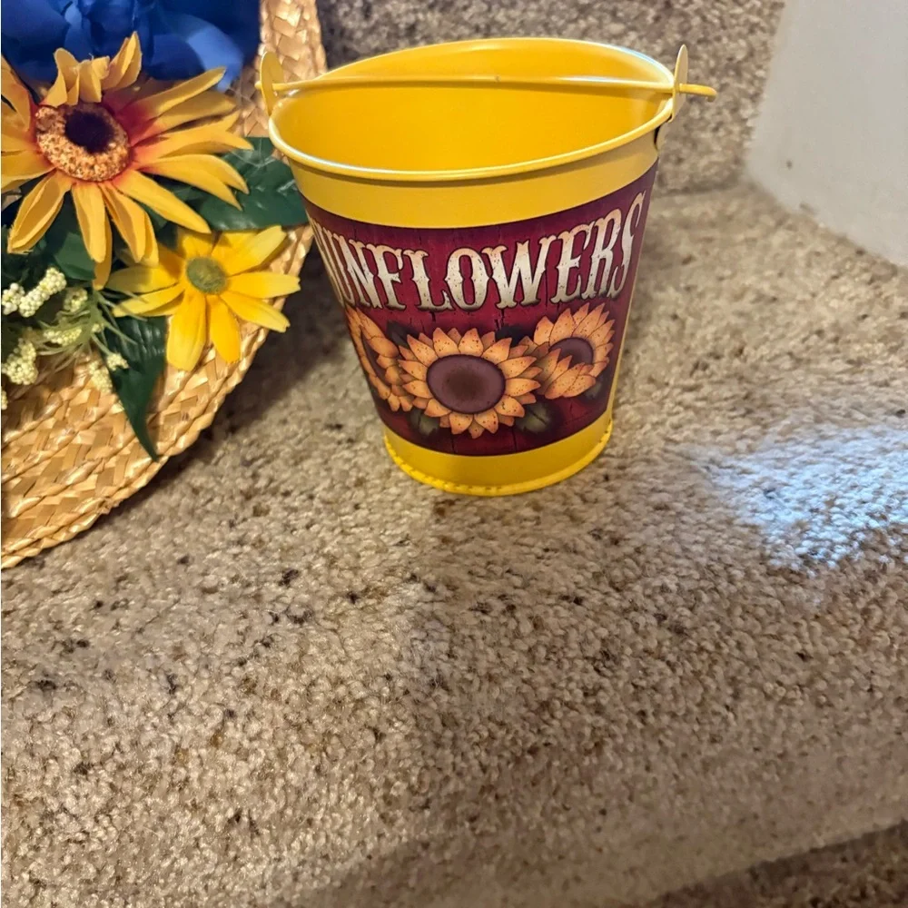 Pretty vintage sunflower straw hat with a sunflower bucket.